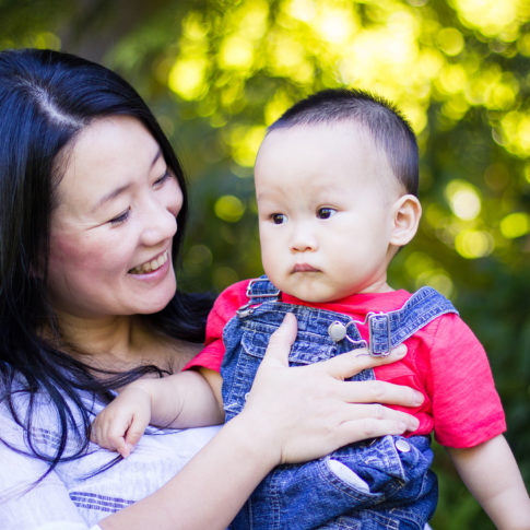 mom holding baby