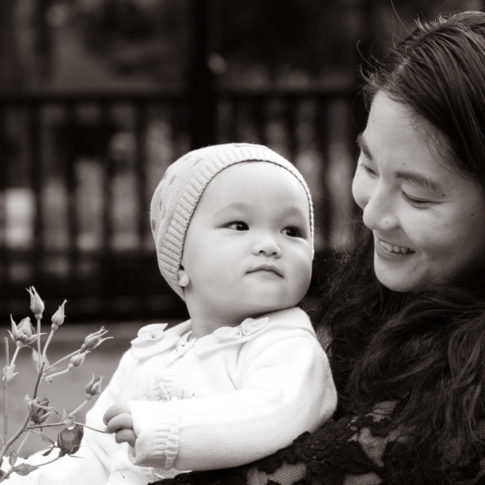 mom holding baby